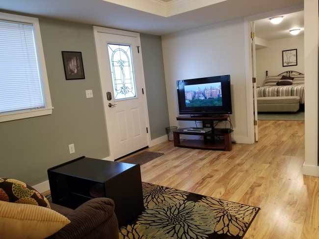 Living area with 43" Roku TV - 8855 39th Ave SW