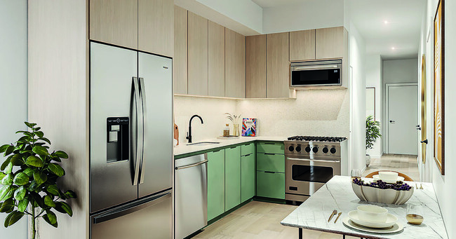 Sleek, contemporary kitchens with premium finishes that inspire culinary creativity. - Bloom Beverly Grove - Fully Furnished Suites