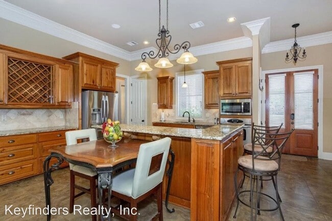 Building Photo - 3 br, 3 bath House - 9430 Magnolia Crossin...