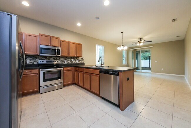 Foto del edificio - 7424 Azalea Cove Cir