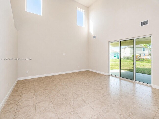 Building Photo - 10976 SW Tessili Wy