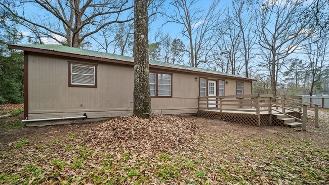 Building Photo - Rural, wooded living in this 4 bedroom, 2 full bath home on just under a quarter of an acre. NEW ...