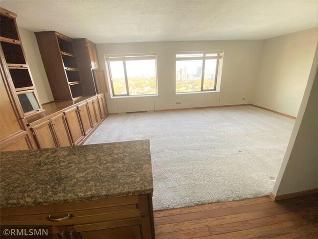 Large living area with plenty of window light. - 19 S 1st St