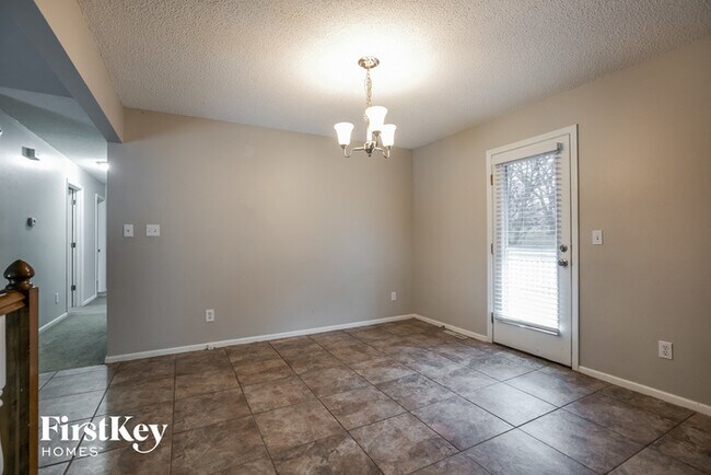 Building Photo - 1233 NW Timber Oak Dr