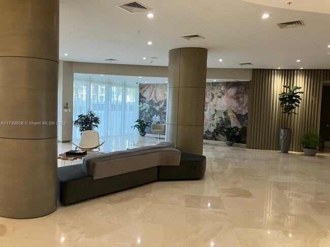 Building Photo - 10275 Collins Ave