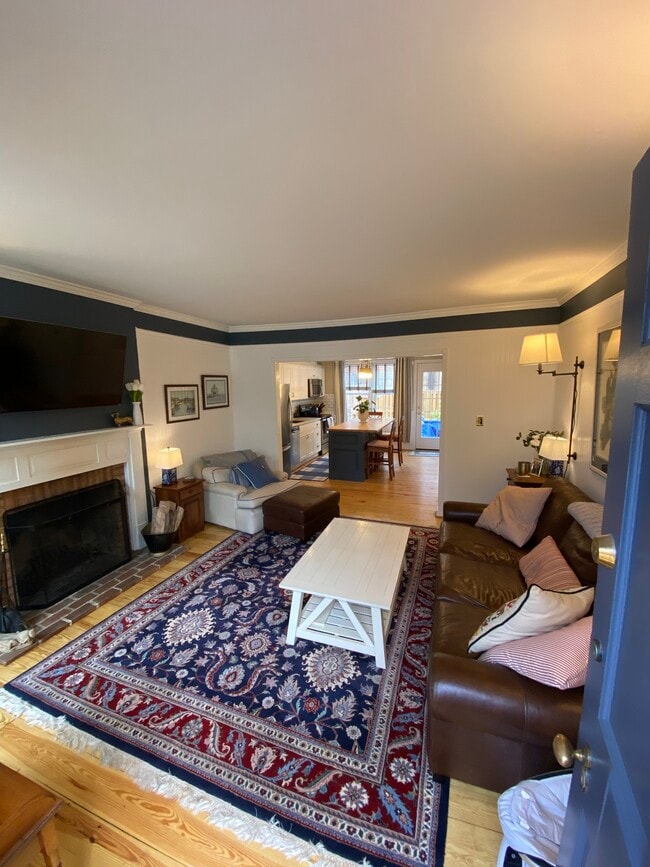 Living Room w/ Wood Burning Fireplace - 145 W Hill St