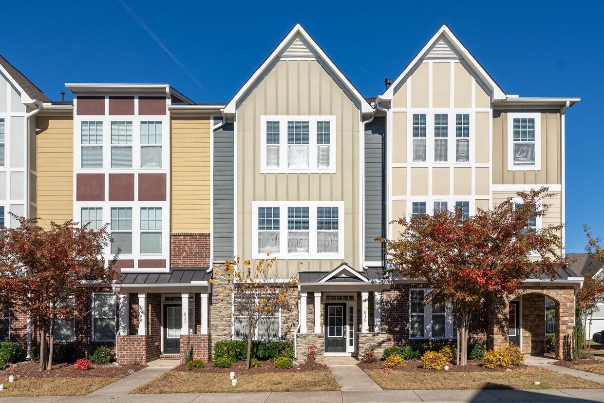 Primary Photo - Introducing a stunning three-story townhom...