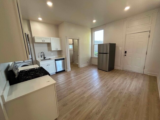 Kitchen with updated appliances - 1408 Russell St