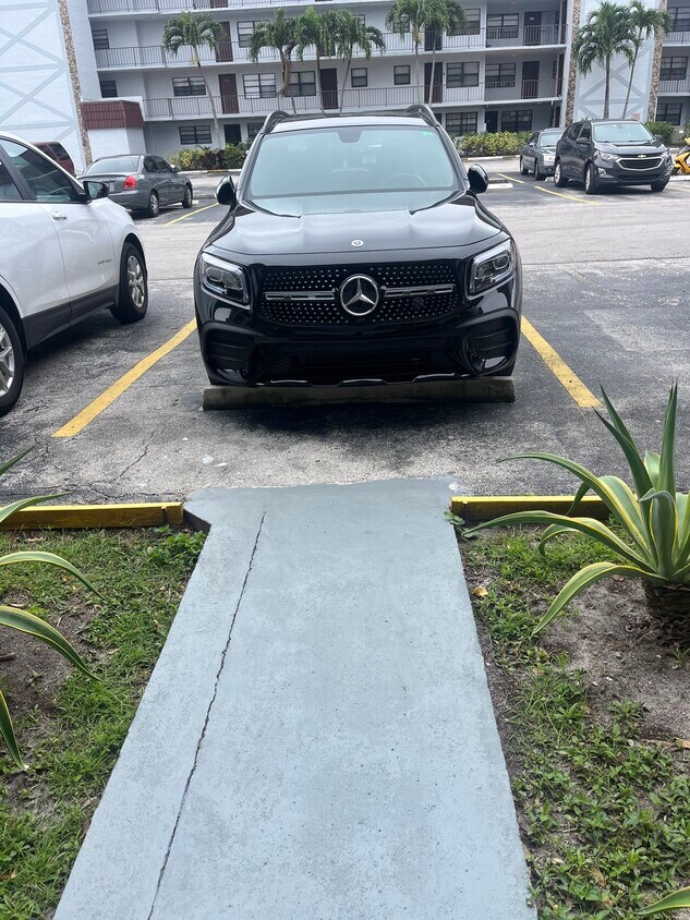 one parking assigned parking and visitor parking - 1335 W 68th St