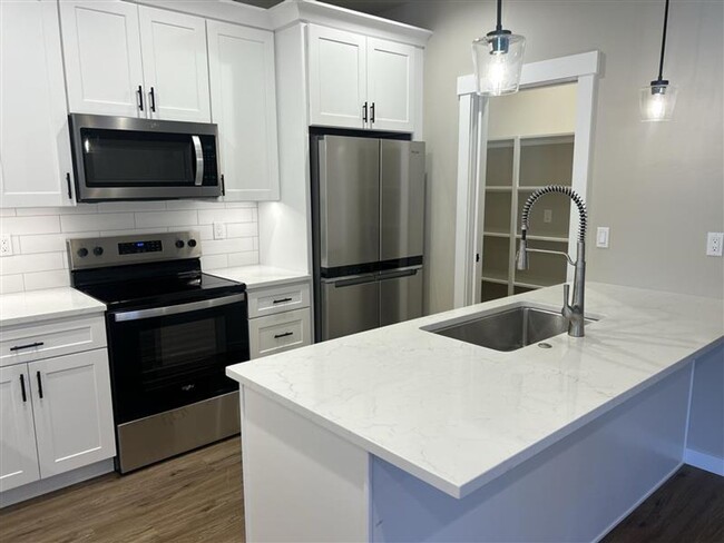 Building Photo - Brand New Construction Three Bedroom Condo...