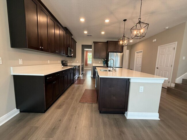 Building Photo - Brand-New 5BR/4BA Rental with Pond View, 4-Car Garage