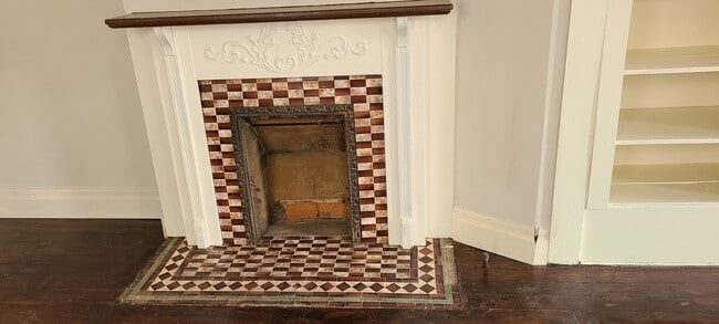 Rookwood Fireplace - 208 E 9th St