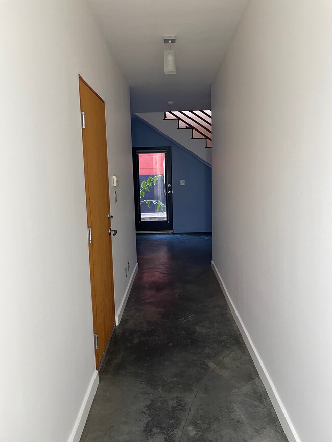 Entry hall w/ garage door on left - 260 6th Ave