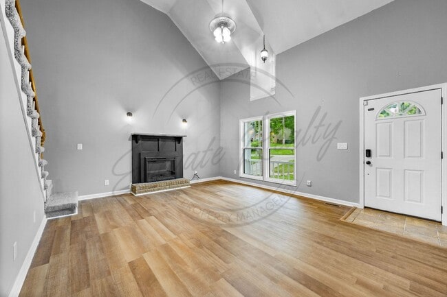 Building Photo - Four Bedroom Two Story with Two Car Garage...