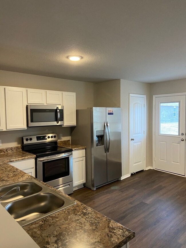 Building Photo - Four Bedroom | Two Bathroom Home in Conrad...