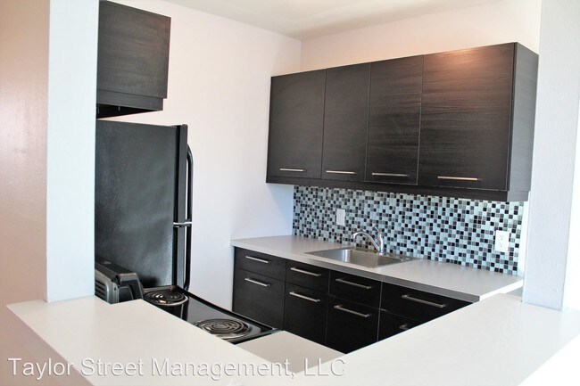 Foto del edificio - 6947 E 6th St