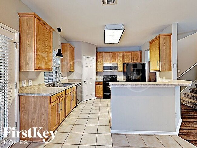 Foto del edificio - 10013 Cherry Hill Ln