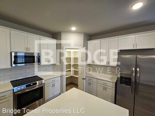 Building Photo - 4 br, 2 bath House - 7506 Escarpment Drive