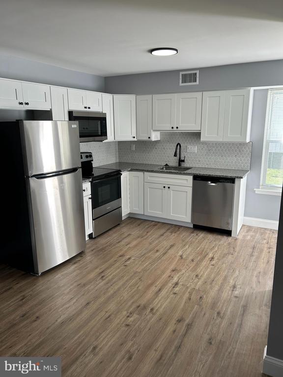 Building Photo - 5709 Cavalier Ct