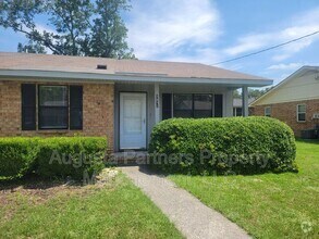 Building Photo - 207 Flores Ln