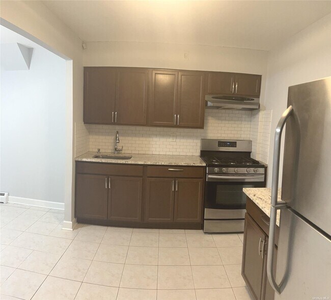 Building Photo - 59-77-77 59th Pl