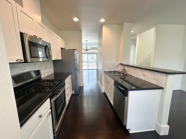 Building Photo - 3 Bedroom Timberland Condo with Attached G...