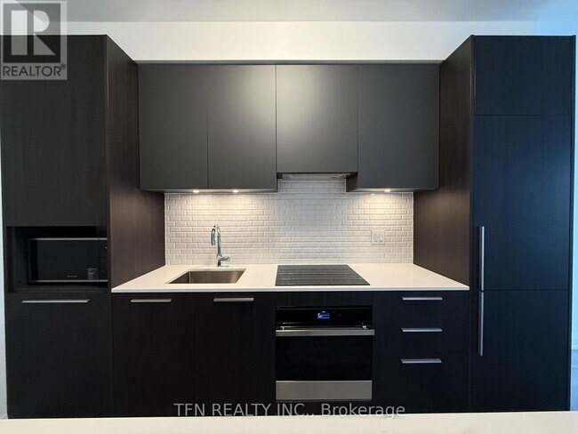 Building Photo - 65 Broadway Ave