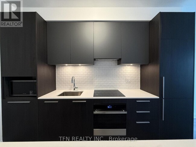 Photo du bâtiment - 65 Broadway Ave