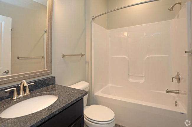 Full bathroom right next to one of the bedrooms. - 340 Continental Cir