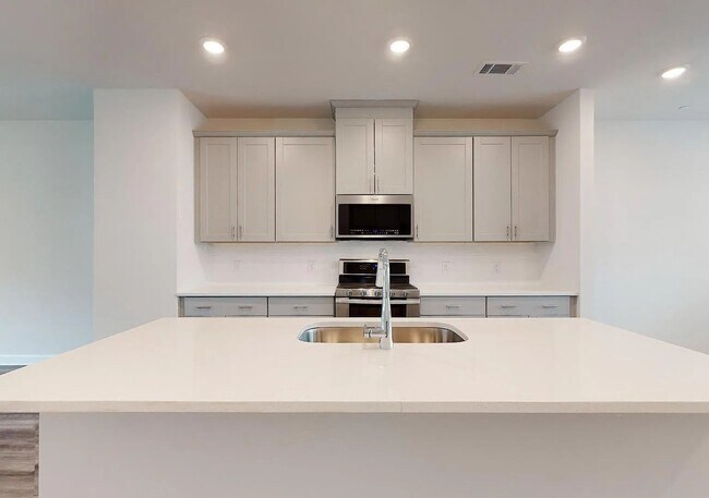 Building Photo - spacious and beautifully appointed townhome