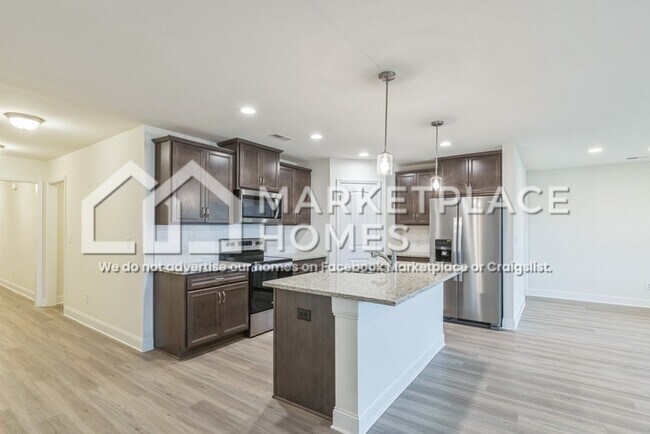 Foto del edificio - 6079 Thorntons Way Cir NW