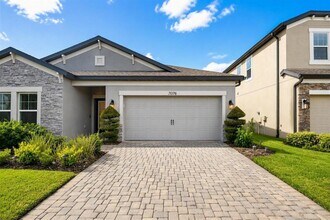 Building Photo - 7076 Gulf Cypress Ave