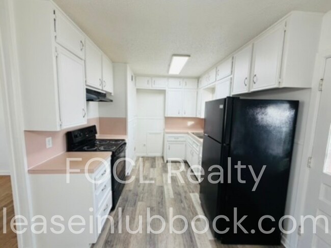 Foto del edificio - 2 bedroom + office, 1 car garage