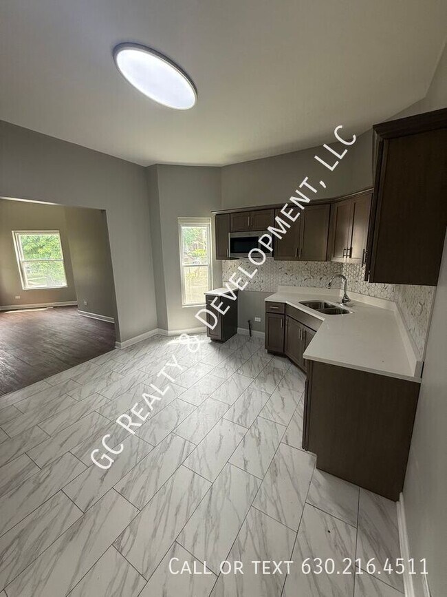 Foto del edificio - 7230 S Perry Ave