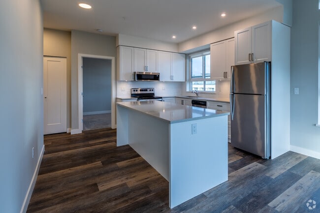 2BR, 2BA — 962SF - Kitchen - Park Suites at Central Park Village