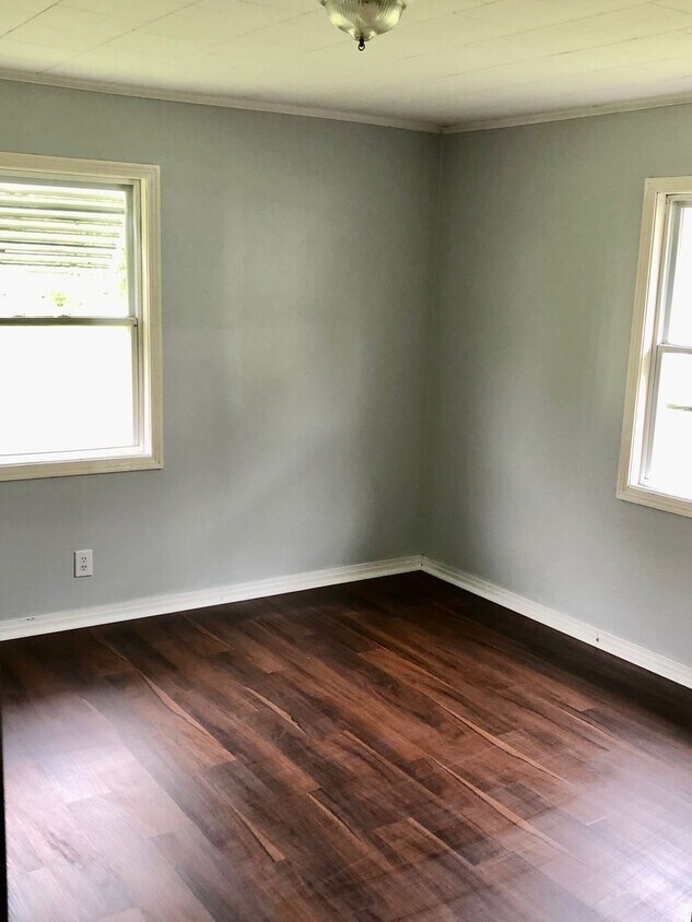 Primary Photo - SPACIOUS Zephyrhills 4BR/1BA Home in the H...