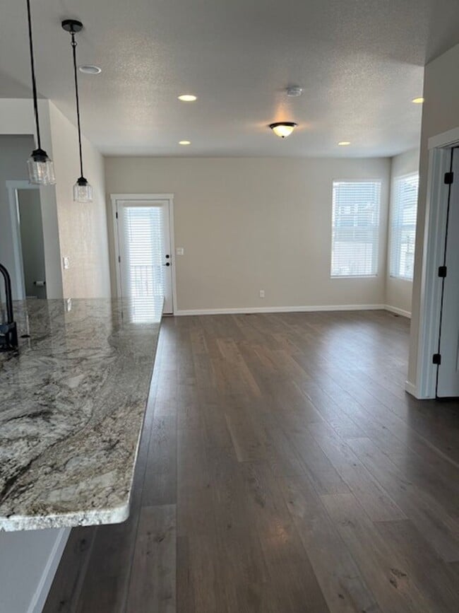 Building Photo - MODERN THREE STORY TOWNHOME WITH 2 CAR GAR...