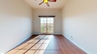 Located at 1520 16th St in midtown Sacramento, this one-bedroom, one-bathroom unit offers a well-designed layout across a single floor. The open kitchen and living area serves as the heart of the space, showcasing rich dark cabinetry, granite countertops, and a full suite of stainless steel appliances including a range, microwave, dishwasher, and refrigerator. Warm hardwood-style flooring flows throughout the main living areas, lending a cohesive and inviting feel. The living area benefits from natural light streaming through large windows, complemented by a ceiling fan overhead. The bedroom is a comfortable retreat, featuring plush carpet, a generous sliding glass door that opens to a private balcony with views of the surrounding neighborhood, and a dedicated closet for storage. The bathroom is thoughtfully appointed with a granite-topped vanity featuring dark cabinetry, a vessel sink, stylish light fixture, and a tub-shower combination with glass sliding doors. Throughout the unit, neutral wall tones and consistent finishes create a clean, modern aesthetic. The space strikes a practical balance between function and style, well-suited for urban living in the heart of Sacramento.