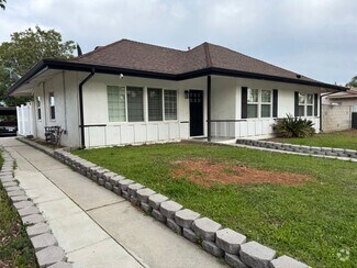 Building Photo - 7840 Woodlake Ave