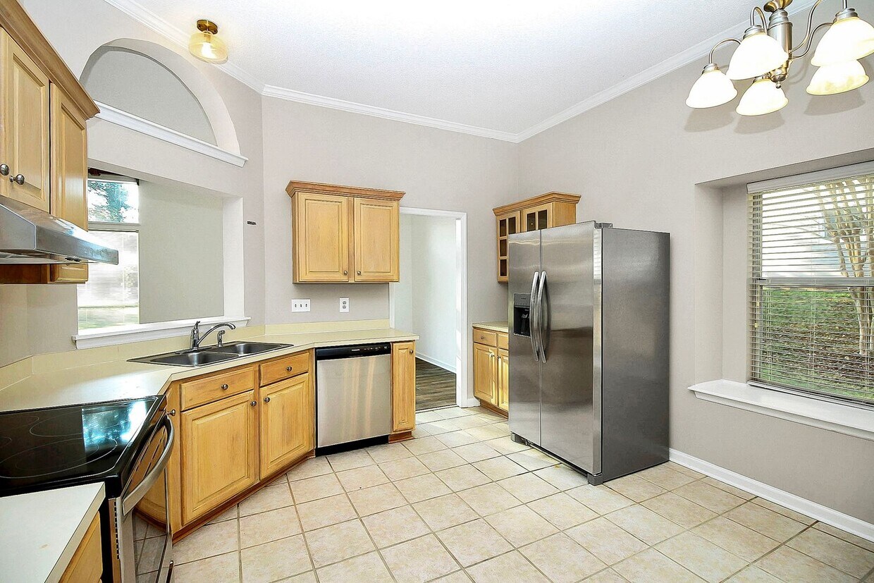 Building Photo - Step into the comfort of 9341 Peckham Rye ...