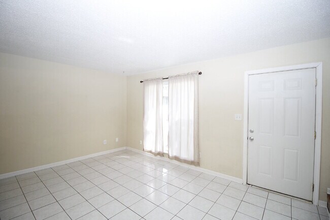 Building Photo - 2-Bedroom Waterfront Townhouse with Community Pool – Available 11/26