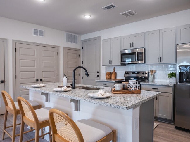 The Escambia: 3BR, 2BA- Kitchen - The Flats at Ransley