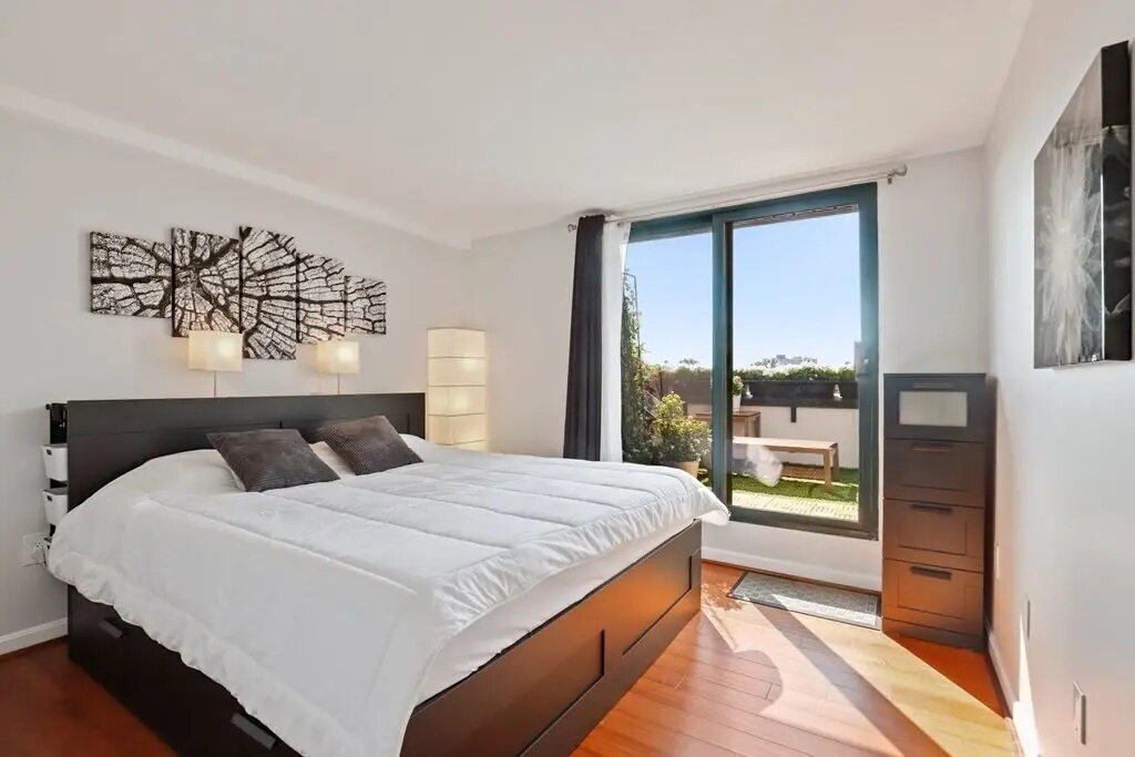 Photo - "Chic 1-Bed Haven in Allston: Furnished Gem with Hardwood Floors & Finished Basement at 59 Brainerd 