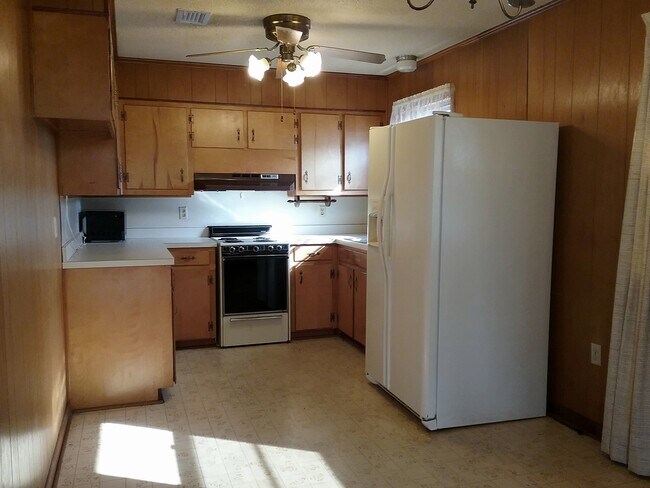 File photo...new floating vinyl tiled floor in kitchen not shown - 2052 Roberts Dr