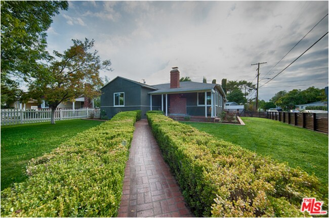 Building Photo - 5757 Vesper Ave