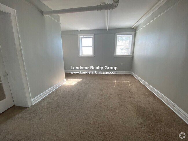 Building Photo - 1053 W Pratt Blvd