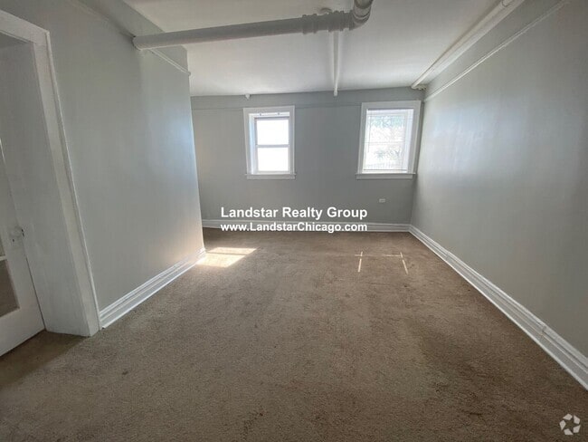Building Photo - 1053 W Pratt Blvd