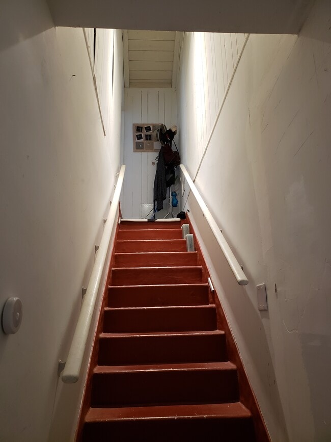 the stairway up to the room - 16020 Firmona Ave