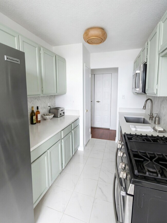 Kitchen Looking in to Front Hallway - 501 Slaters Ln