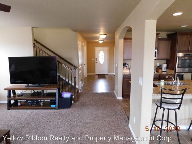 Building Photo - 4 br, 3 bath House - 9511 Desert Lily Circle